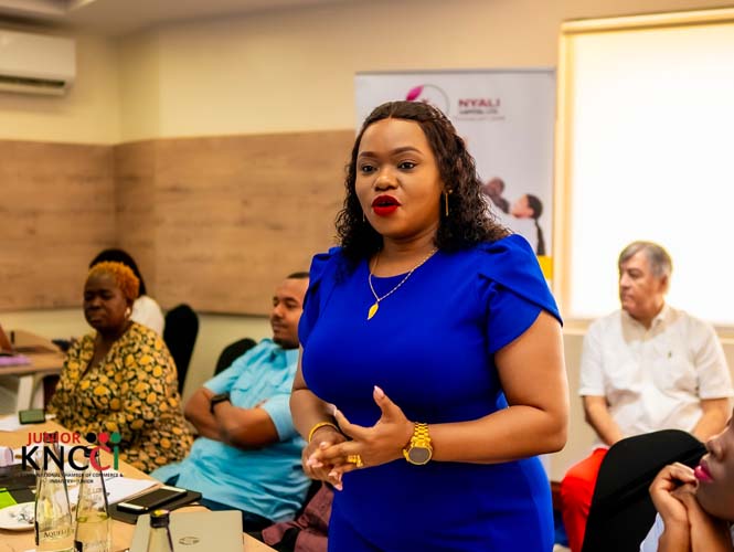 A business lady giving a talk during the Women In business forum by Kncci in mombasa